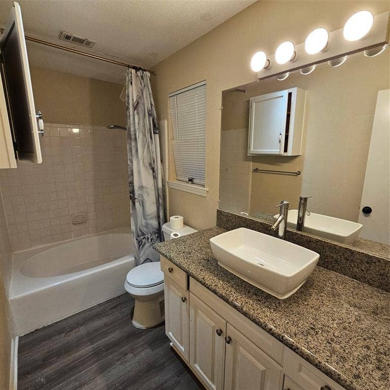 5616 PRESTON OAKS, #1101, Dallas, TX 75254 Full bathroom featuring shower / bath combo