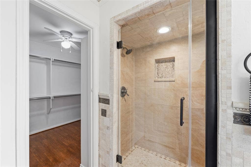1509 Aylesbury Lane, Plano, TX 75075 Walk-in oversized travertine shower.