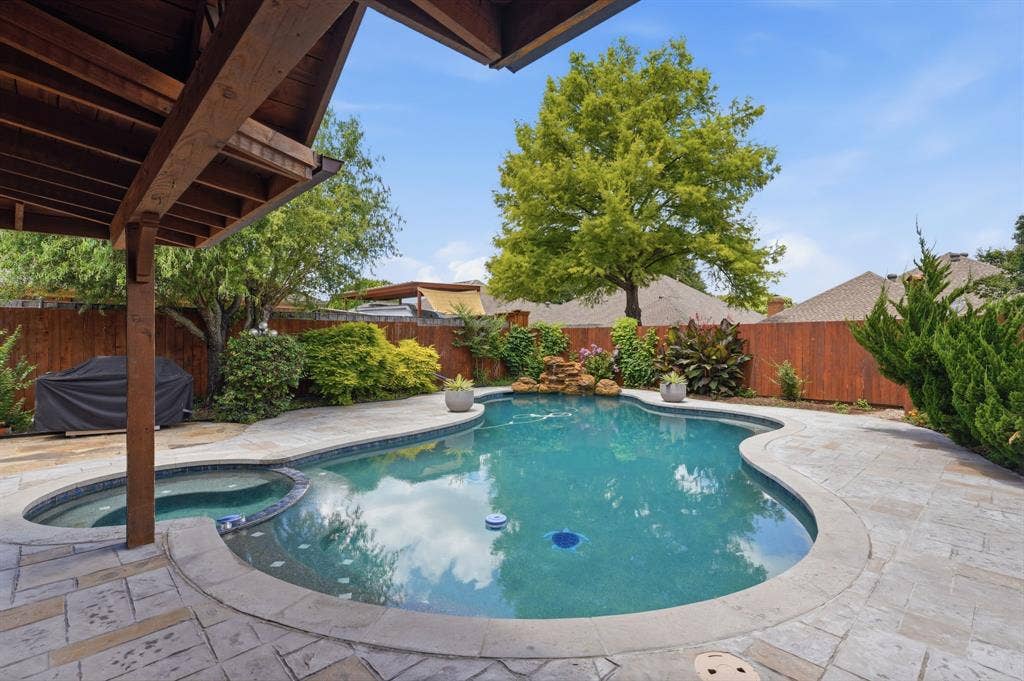 1509 Aylesbury Lane, Plano, TX 75075 This backyard steals the show for sure, pool & spa.