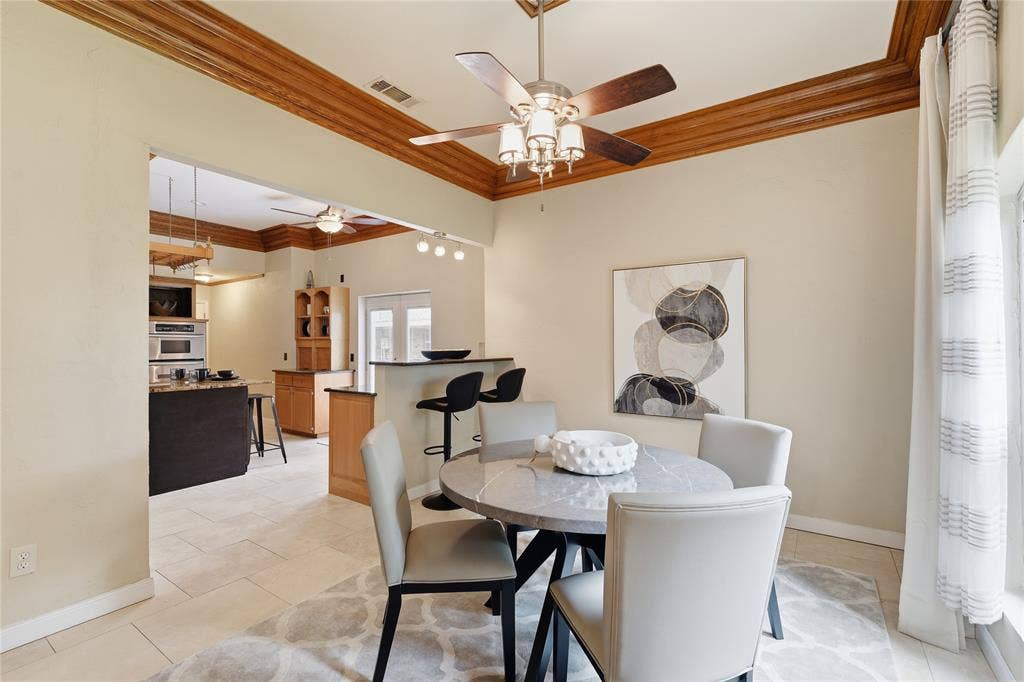 1509 Aylesbury Lane, Plano, TX 75075 Formal dining room is open to the kitchen.