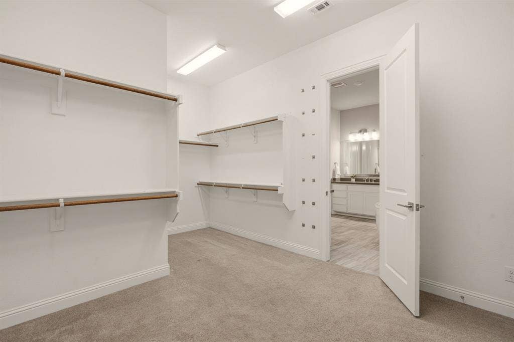 Primary Closet connects to Primary Bathroom and Laundry Room