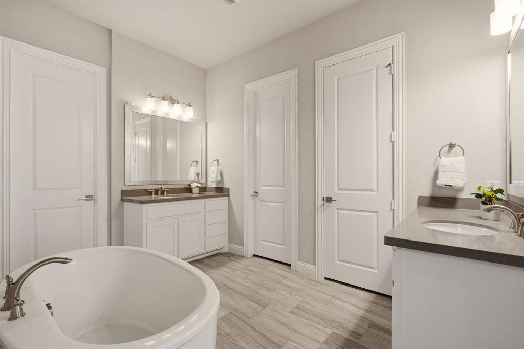 Large Soaking Tub and Two Vanities