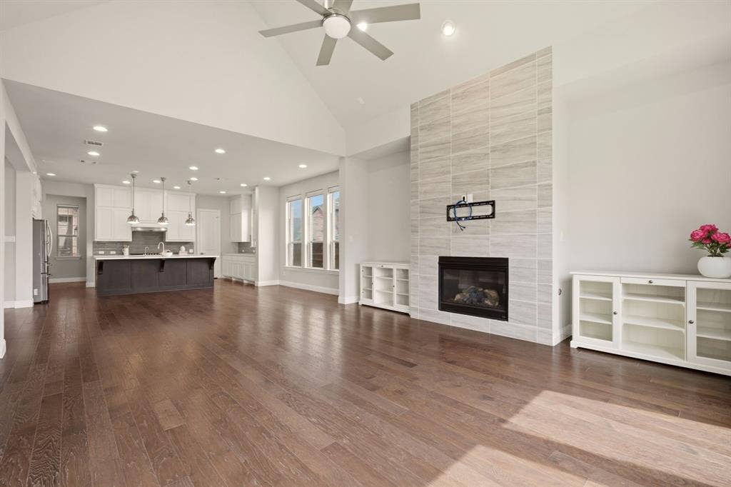 Open Concept Living connects to Dining and Kitchen. Gas FP.