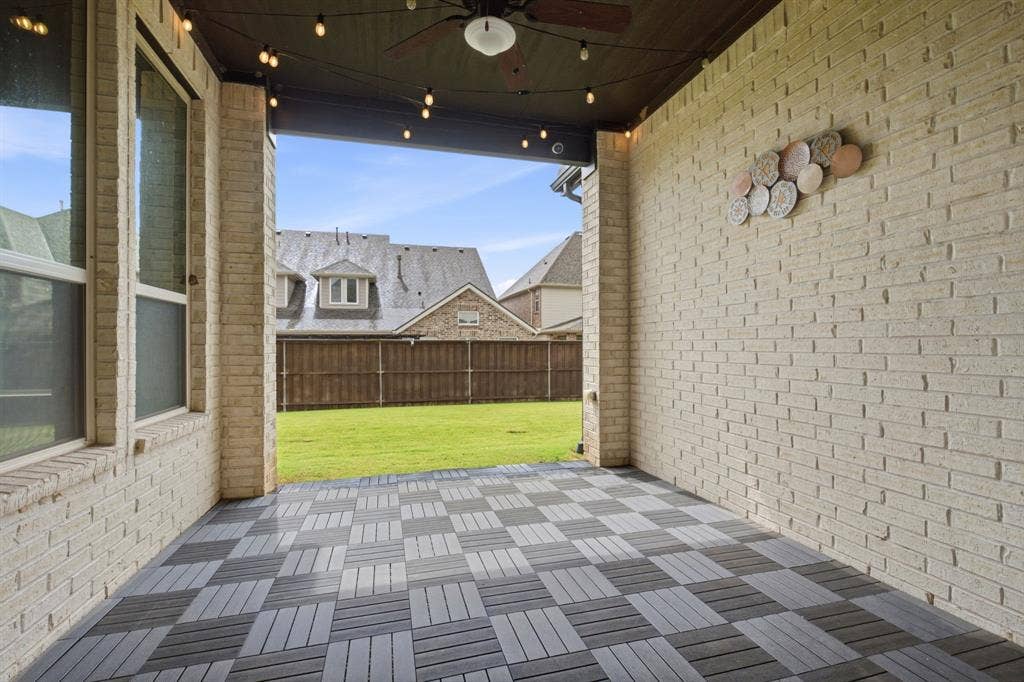 Large Covered Patio overlooks backyard