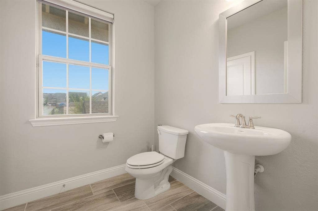 Half Bath Upstairs next to Media Room