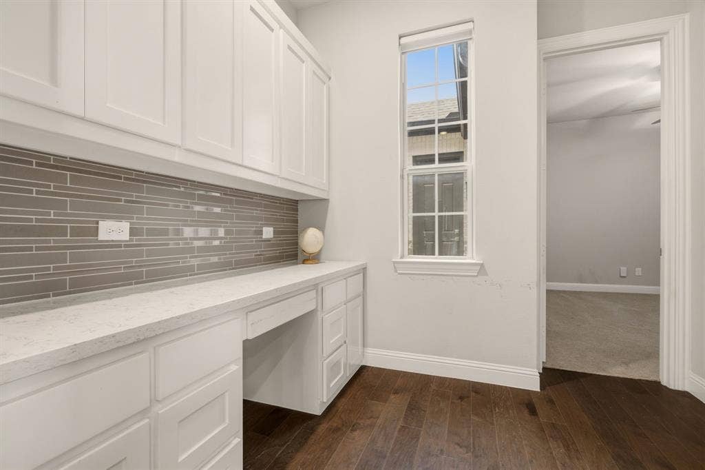 Built in Desk with Cabinets off of Kitchen