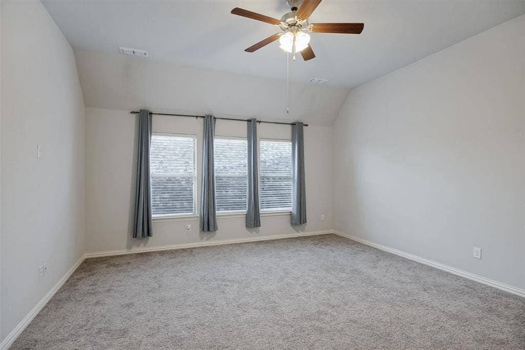 Gameroom with dual attic access.