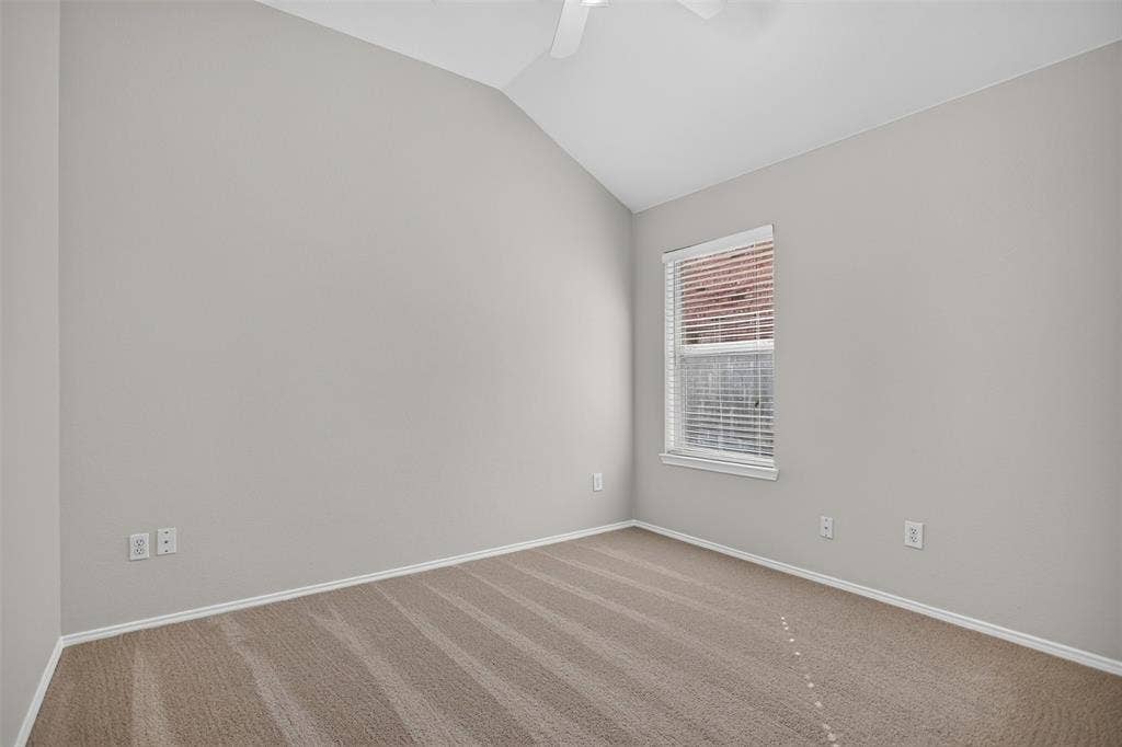 2691 Eganridge Lane, Rockwall, TX 75087 Vaulted ceilings, neutral wall tones, wall-to-wall carpeting, and a single-hung window with built-in blinds