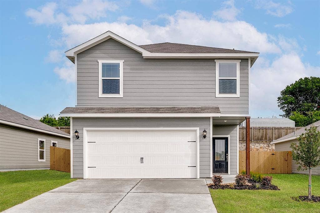 6307 Crosswood Lane, Dallas, TX 75241 Traditional-style home with an attached garage, concrete driveway, and a shingled roof
