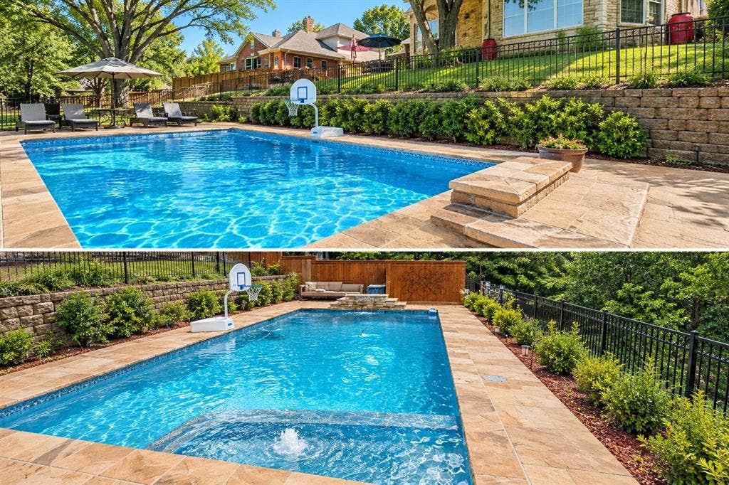 2404 Creek Ridge Drive, McKinney, TX 75072 In-ground swimming pool featuring a built-in water feature, stone paver decking, decorative stone retaining walls, and perimeter metal fencing
