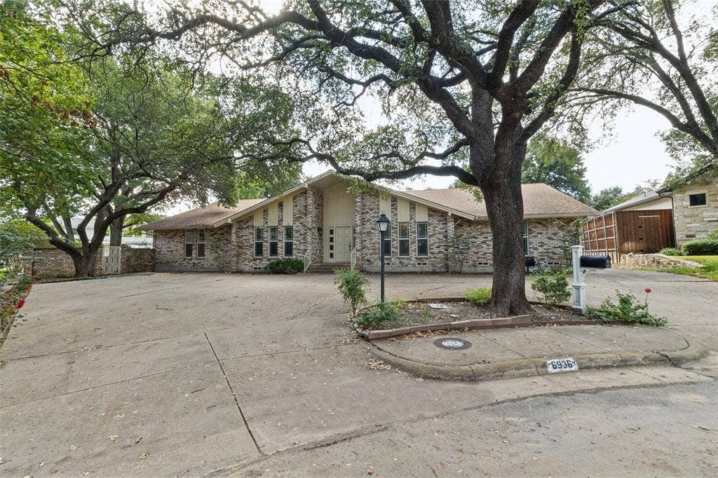 6936 Wildglen Drive, Dallas, TX 75230 Amazing parking area out front plus a three car garage in back