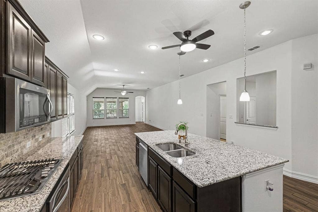 6706 Rutledge Court, Garland, TX 75044 Open concept keeps the cook engaged with guests!