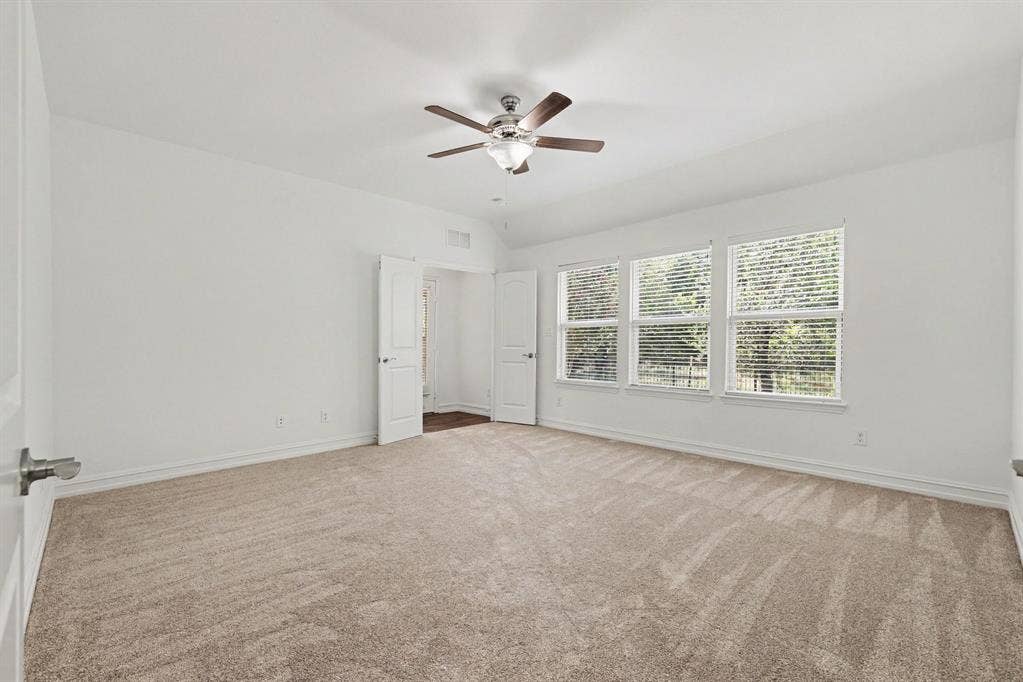 6706 Rutledge Court, Garland, TX 75044 Primary Bedroom overlooking back yard and green space;