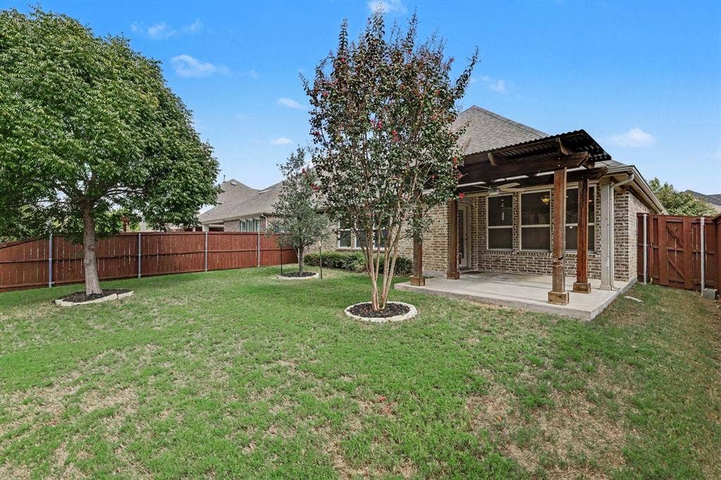 6706 Rutledge Court, Garland, TX 75044 Back yard...dog and kid approved!