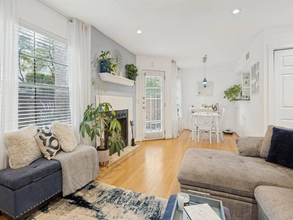 Light color wood flooring throughout.