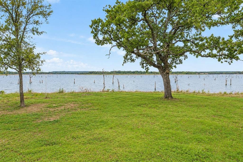 1579 Eastside Lake Road, Graham, TX 76450 Lake shore area in back yard