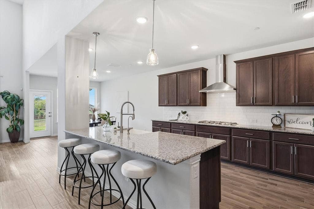 6417 Dolan Falls Drive, Northlake, TX 76226 Island with seating options in the heart of the home