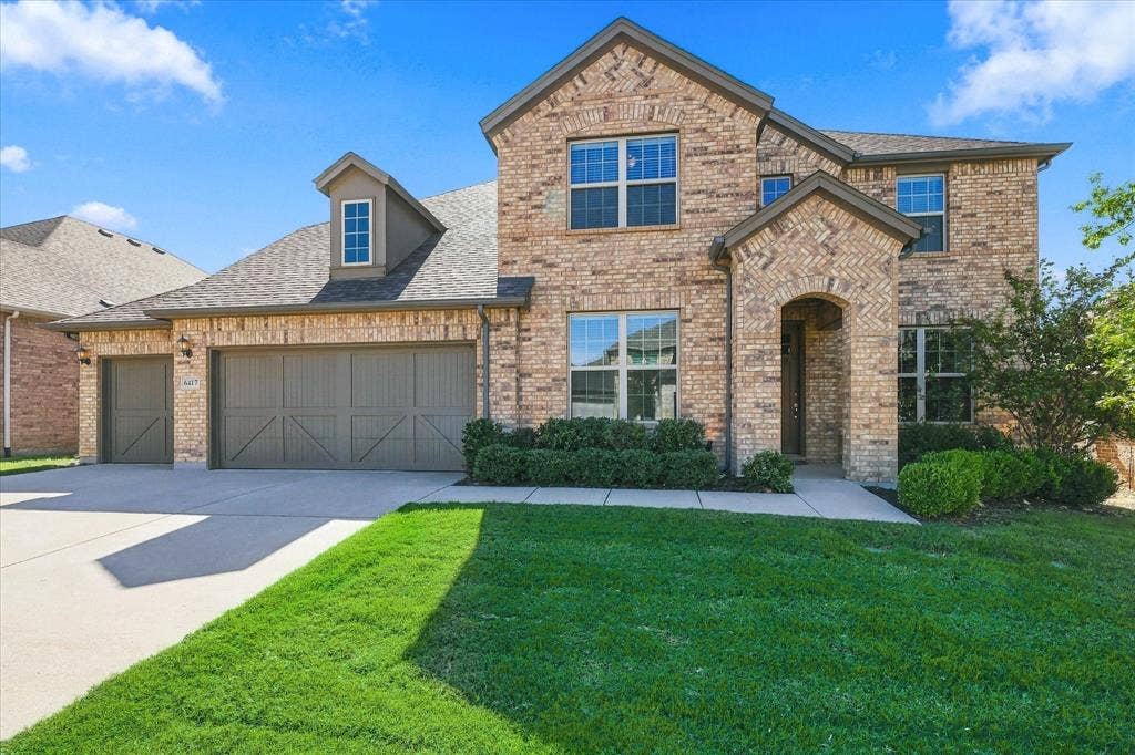 6417 Dolan Falls Drive, Northlake, TX 76226 Ample driveway space and side-by-side three car garage.