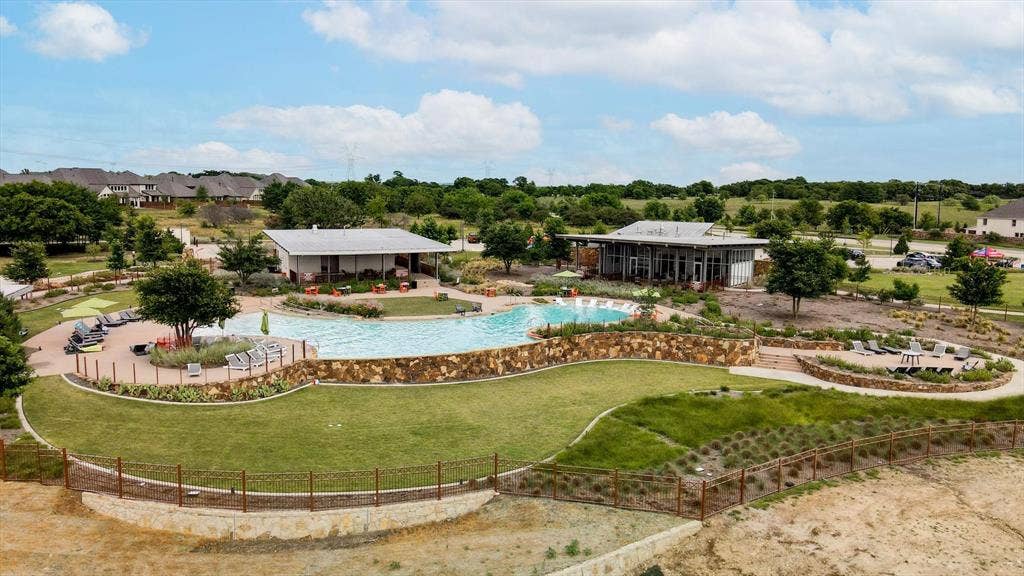 6417 Dolan Falls Drive, Northlake, TX 76226 Community amenity resort style pool surrounded by lush private greenspace - a must see!
