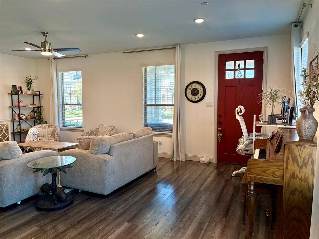 9096 Phoebe Road, Frisco, TX 75035 Wood-finish flooring, recessed lighting, ceiling fan with light kit, double-hung windows, and a multi-pane solid wood entry door