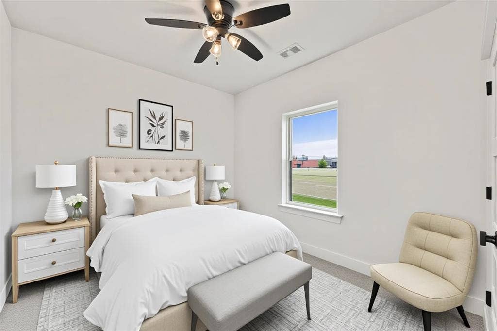 Bedroom featuring carpet flooring and ceiling fan