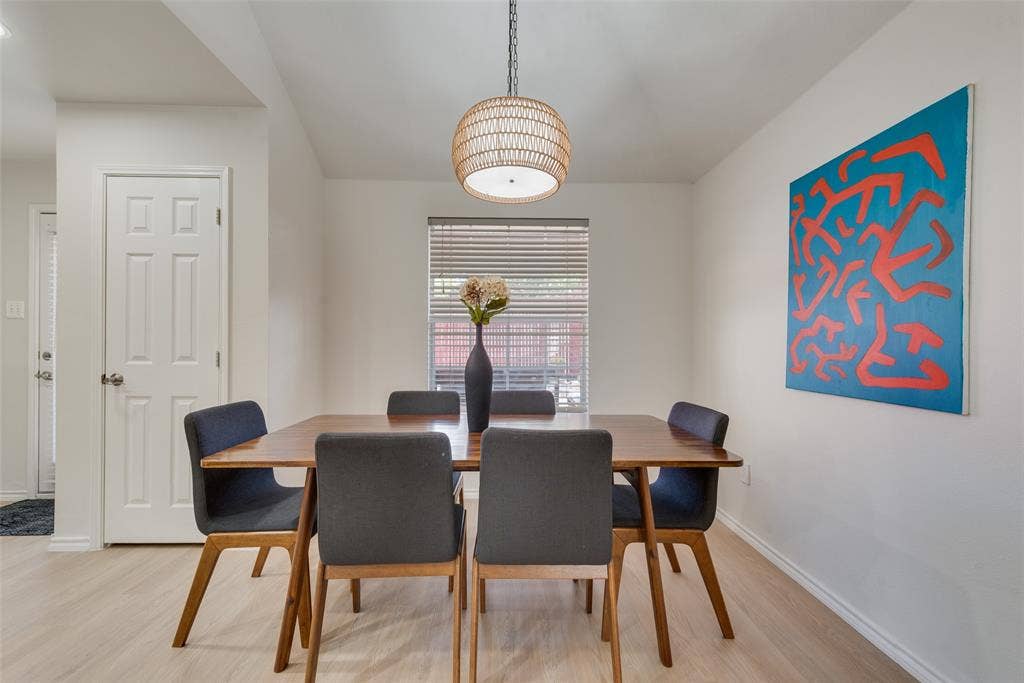 4104 Creekmeadow Drive, Carrollton, TX 75010 Woven basket-style pendant light fixture, wood-finish flooring, and horizontal window blinds