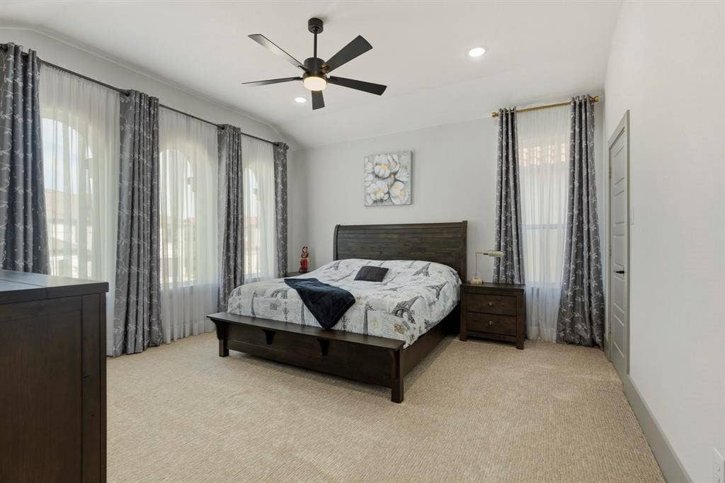 12173 Deer Trail, Frisco, TX 75035 Spacious interior featuring arched windows, high vaulted ceilings, recessed lighting, and a multi-blade ceiling fan