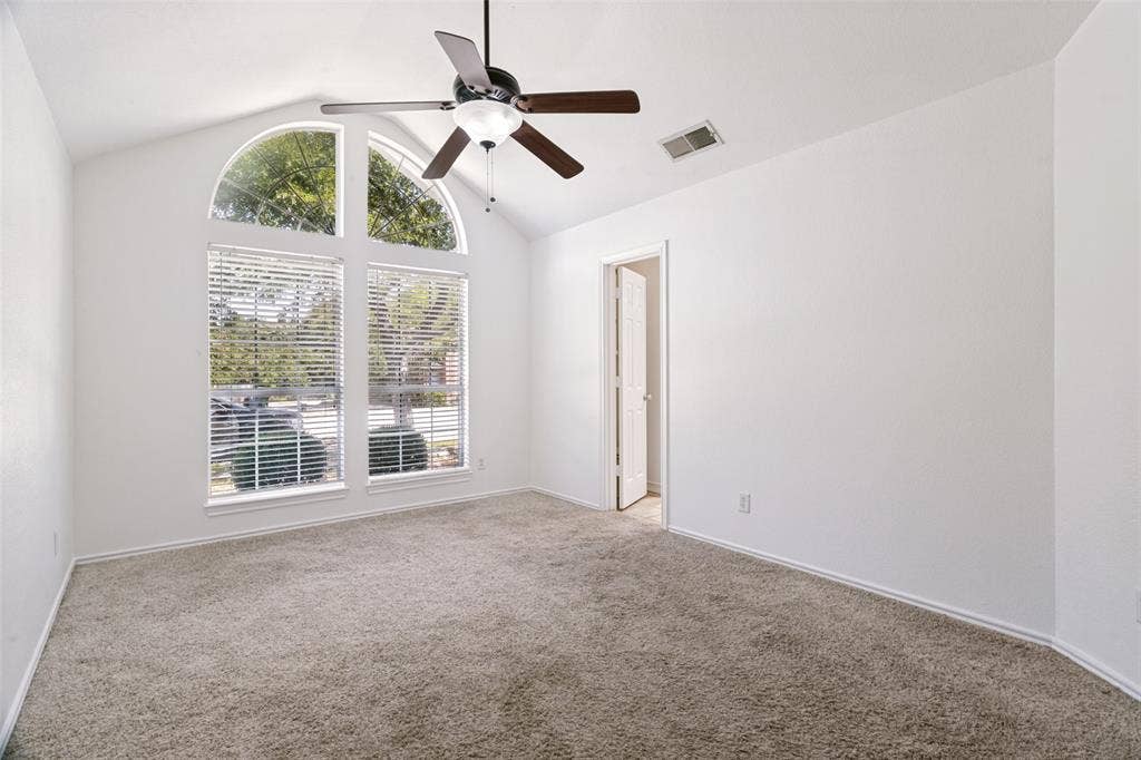 Oversized Primary bdrm with vaulted ceiling, ensuite full bath & fresh paint.
