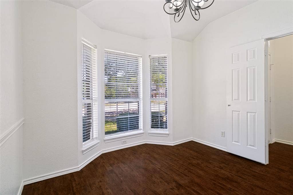 Spacious dining room that can also be an office or another living area.