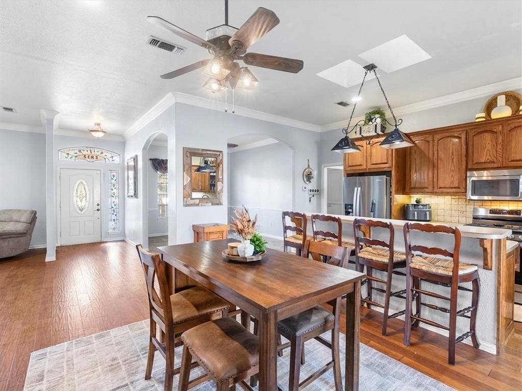 3103 Rim Rock Court, Granbury, TX 76049 Kitchen with additional bar seating