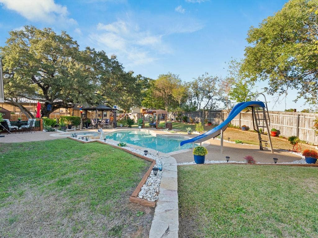 3103 Rim Rock Court, Granbury, TX 76049 Pool and fun slide