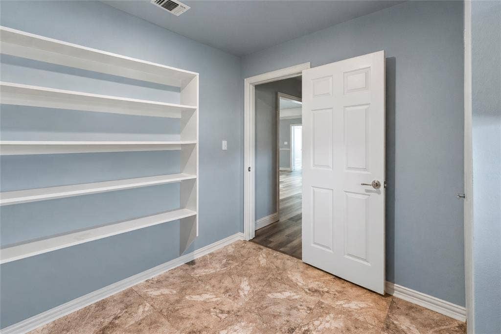 5795 Spillane Street, Nevada, TX 75173 Pantry, laundry, storage and water heater
