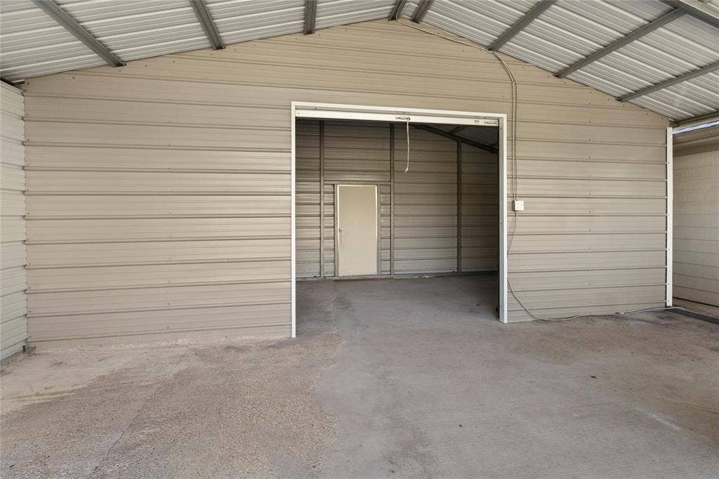 5795 Spillane Street, Nevada, TX 75173 Carport with electric and storage