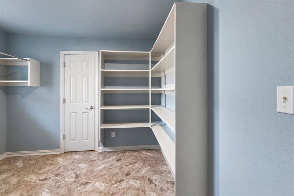 5795 Spillane Street, Nevada, TX 75173 Pantry, laundry, storage and water heater