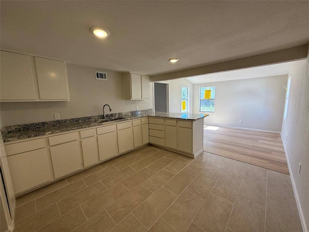 Upgraded flooring, granite counter tops