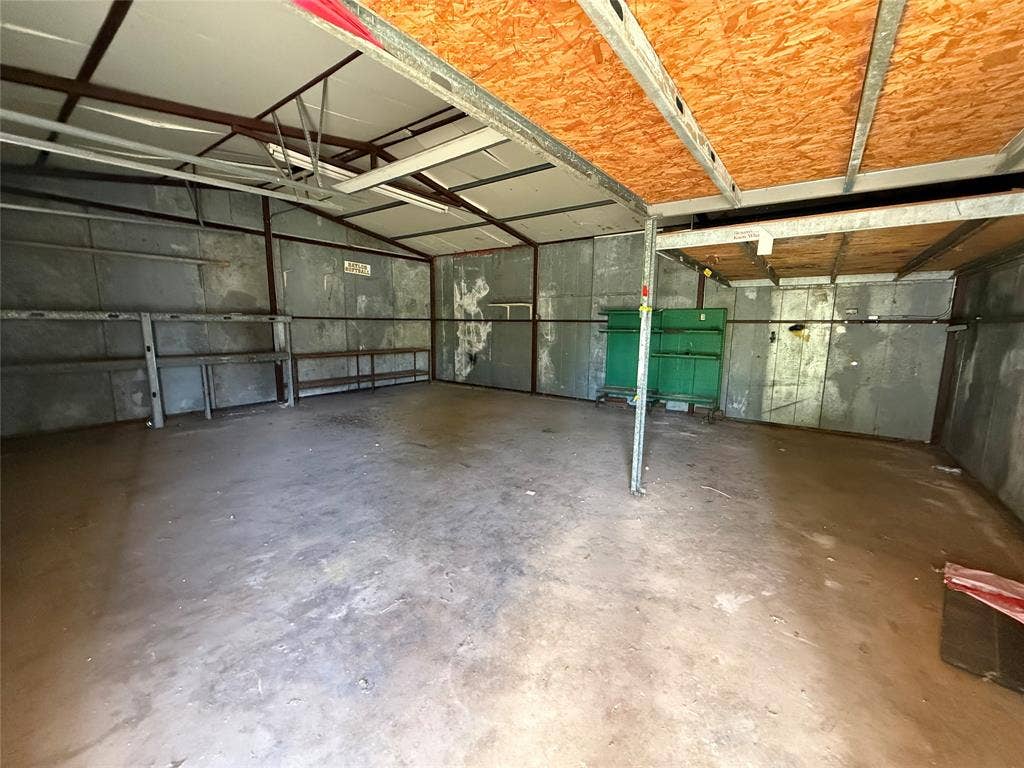 Working garage with electrical and doors