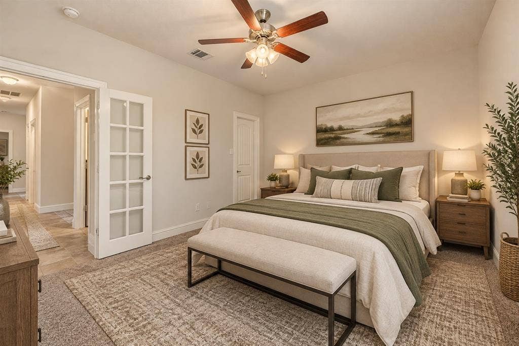 284 Goliad Trail, Forney, TX 75126 Neutral-toned interior featuring a multi-light glass panel door and a ceiling fan with integrated light fixture