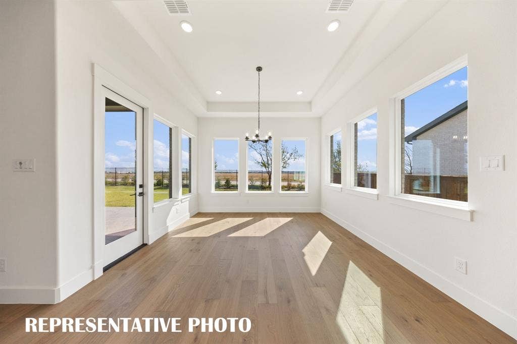 Whether it's lively dinner parties or cozy family get togethers, this dining room fits all occasions!  REPRESENTATIVE PHOTO