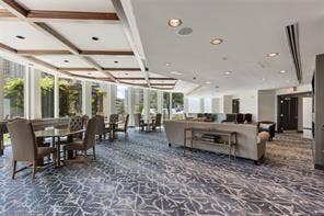 500 Throckmorton Street, #2702, Fort Worth, TX 76102 Coffered ceiling with wood-finish trim, expansive floor-to-ceiling windows, and recessed lighting