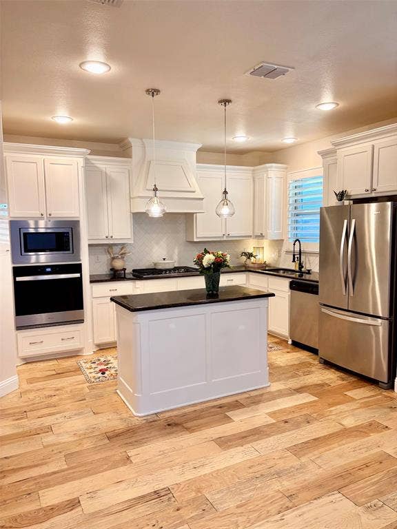 Painted kitchen cabinets, walls, new oven, gorgeous!