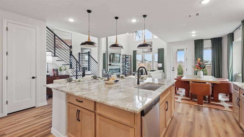 Model home photos of similar floorplans, not pictures of actual home.