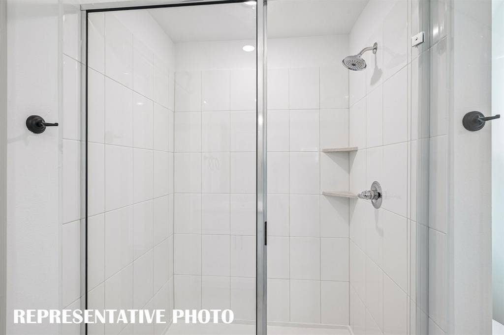 You'll enjoy a large walk in shower when you call this owner's bath your own!  REPRESENTATIVE PHOTO