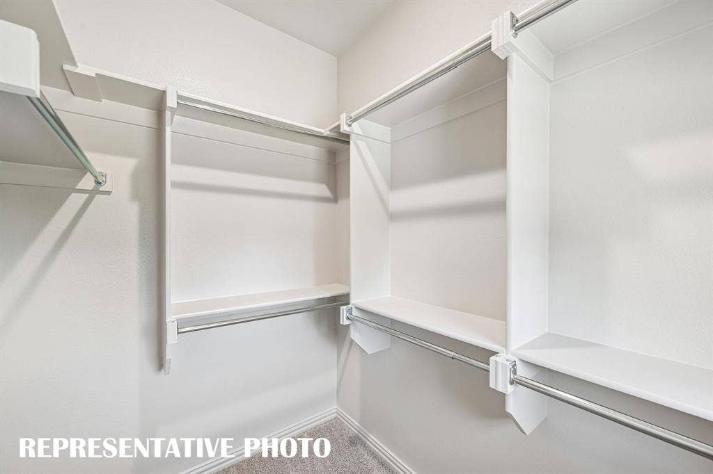 Plenty of hanging space in this dream owner's closet!  REPRESENTATIVE PHOTO