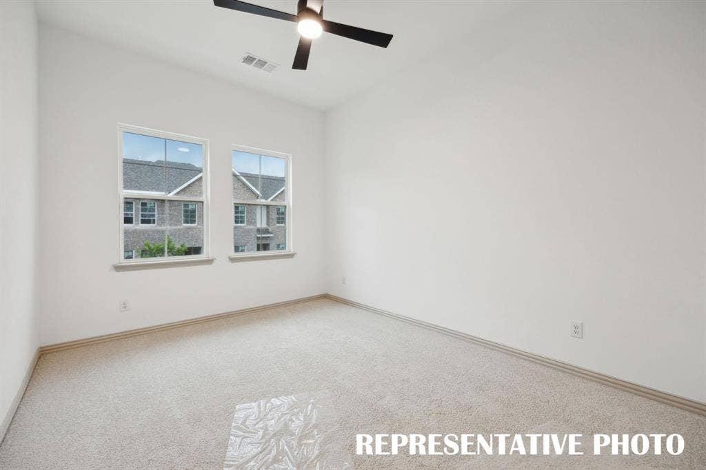 5312 Springlake Parkway, Haltom City, TX 76117 This light, bright owner's bedroom is the perfect place to relax and unwind at the end of the day. REPRESENTATIVE PHOTO