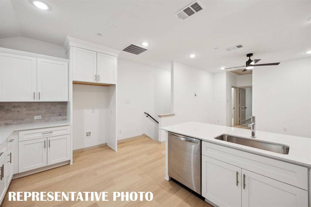 5312 Springlake Parkway, Haltom City, TX 76117 You'll find designer chosen finishes like shaker style cabinets, gorgeous flooring, stainless appliances and beautiful counter tops in our Elizabeth plan! REPRESENTATIVE PHOTO