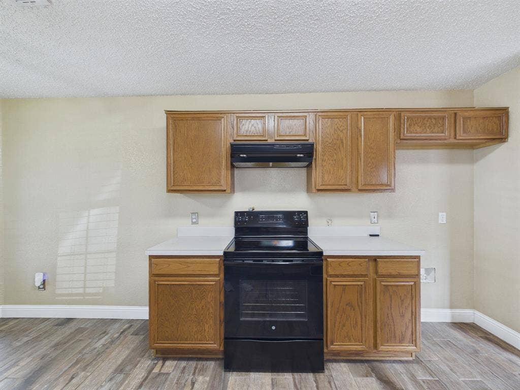 Does not include the refrigerator.