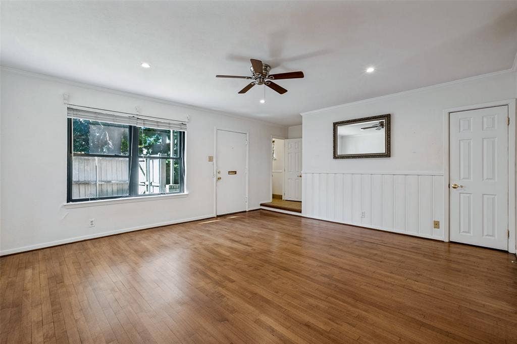 As you enter from the front door you step inside the living room which is connected to the dining room.