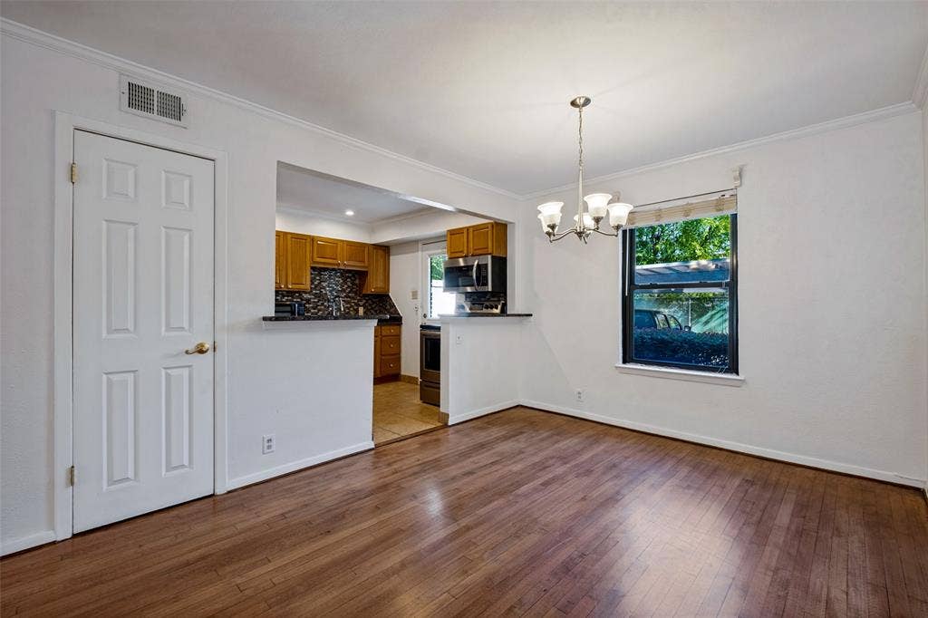 Hardwood Floors run through out the living and dining area.