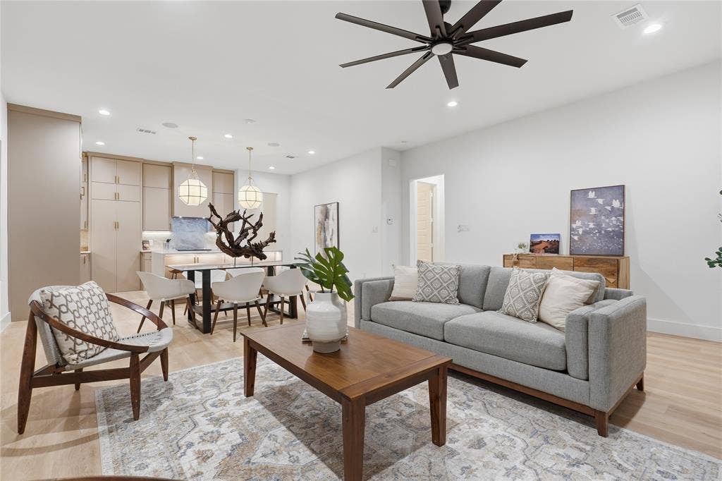 1834 Gallagher Street, Dallas, TX 75212 Open-concept interior featuring wood-finish flooring, recessed lighting, a modern ceiling fan, and built-in cabinetry with pendant lighting