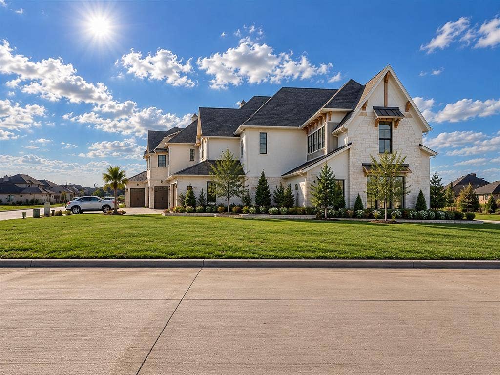 Multi-story residence featuring a combination of light-toned masonry and stucco cladding, gabled rooflines with decorative timber accents, and a multi-car garage